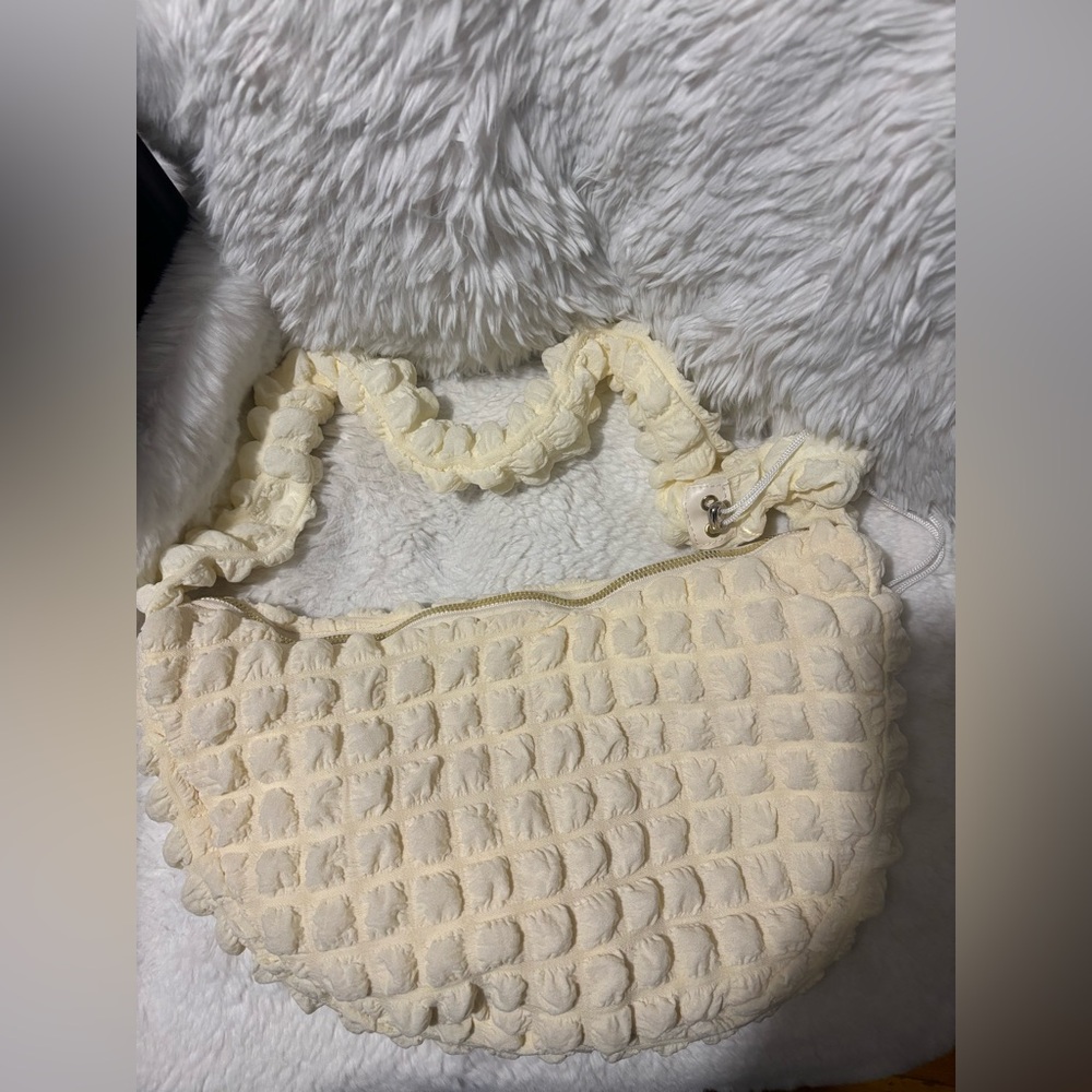 Cream Textured bag with Ruffled Straps